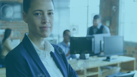 standing confidently in office, professional with colleagues working in background
