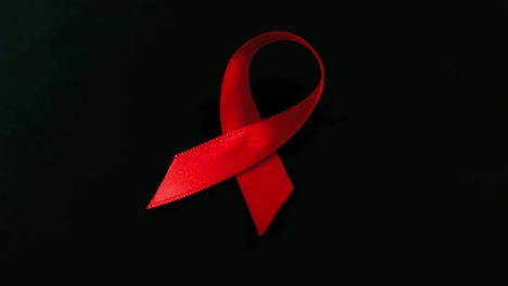 aids red ribbon falling over