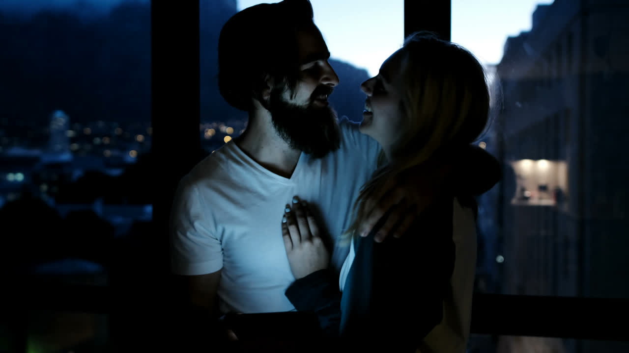 Couple using digital tablet at home 4k
