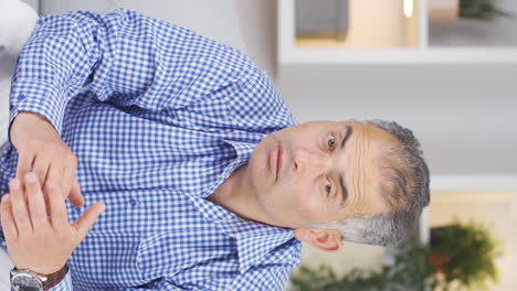 Vertical-video-of-Man-giving-greeting-and-applause-to-camera.