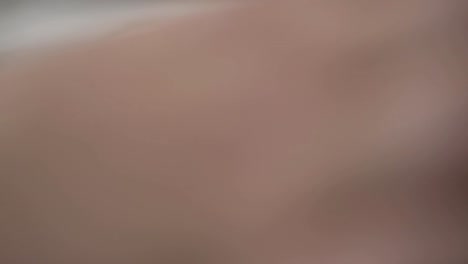 fingers typing on a white keyboard, close-up