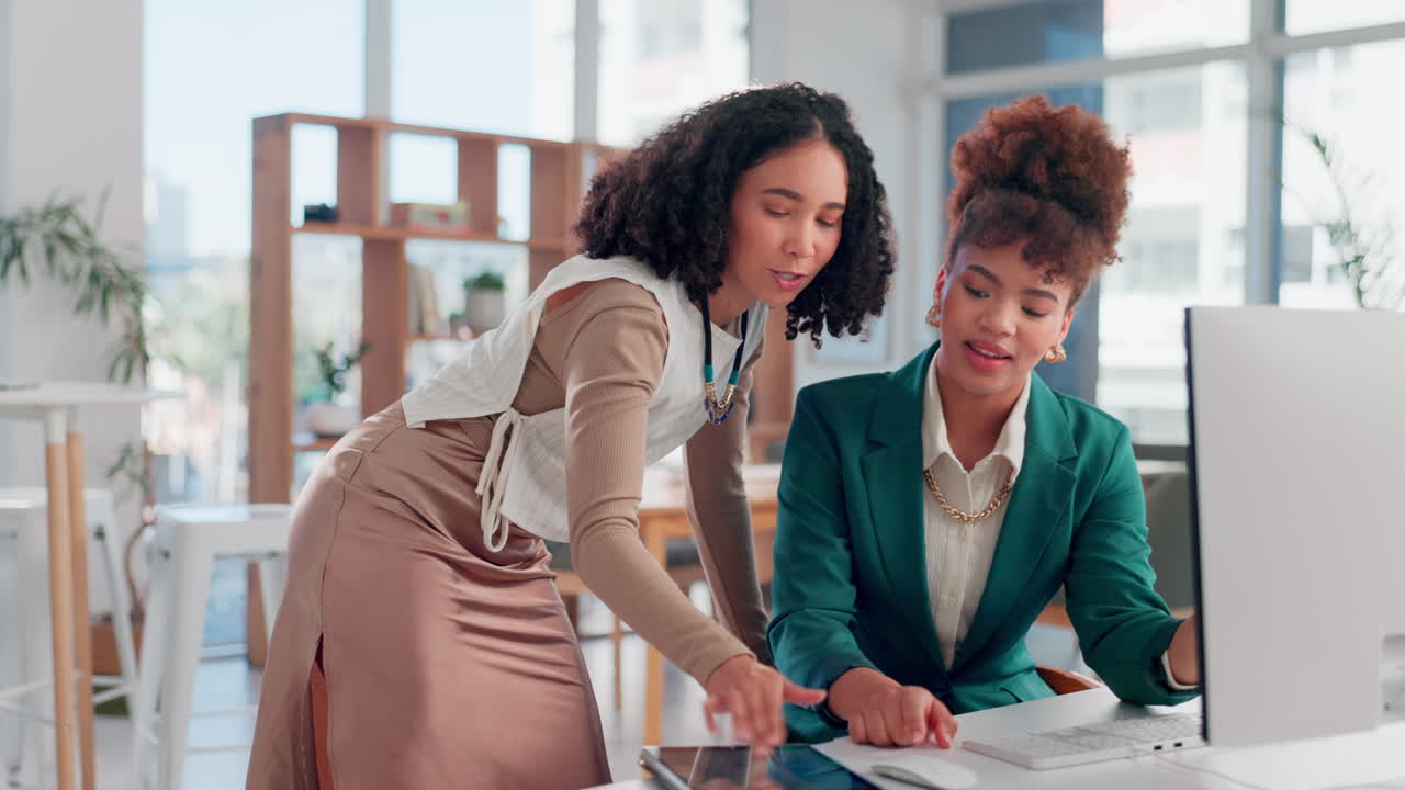 Two Businesswomen Collaborating on a Project