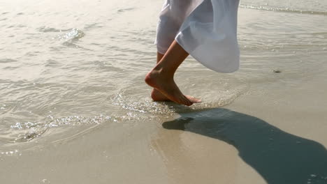 Woman-walking-in-the-water