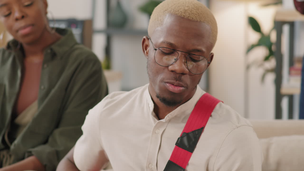 Man Playing Electric Guitar and Singing