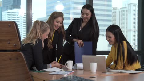 group meeting of professional businesswomen thinking with new project planning.