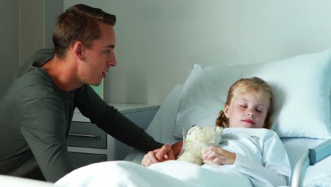 Father-interacting-with-her-sick-daughter