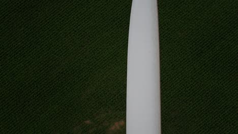 propeller blades of a wind turbine close up shot with an aerial drone for inspection