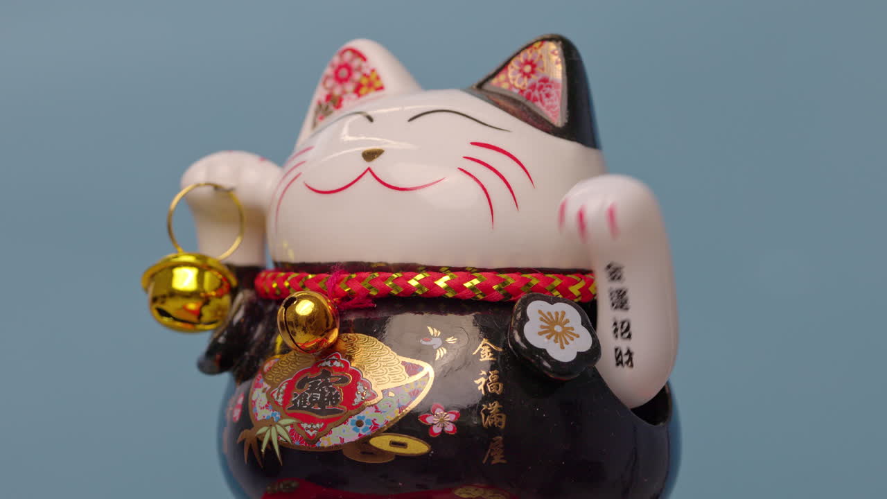 el gato de la suerte manejo agita