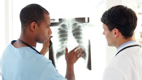 Surgeon-and-doctor-looking-over-xray-together