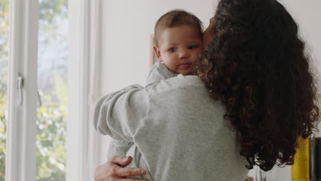 mother holding baby at home calming tired newborn gently soothing restless infant nurturing child loving mom enjoying motherhood