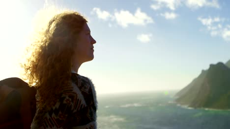 woman relaxing in countryside on a sunny day 4k