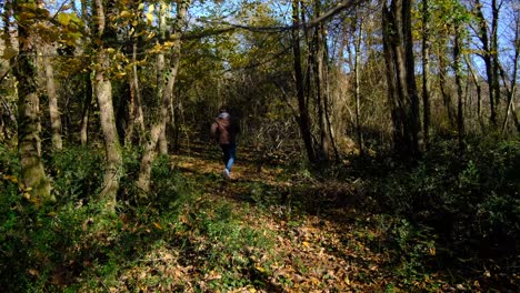 teenager runing in forest