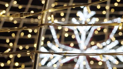 christmas light decoration at night with a large snowflake shape