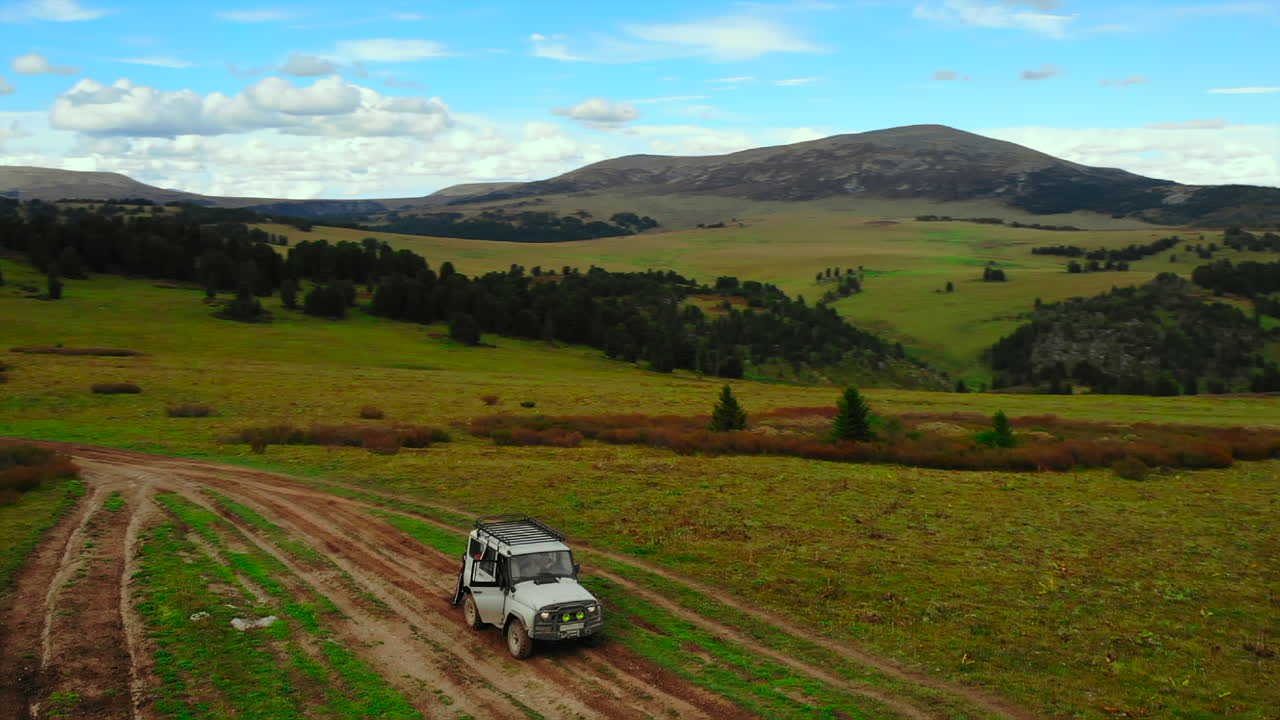 Off-Road Vehicle in Mountain Landscape