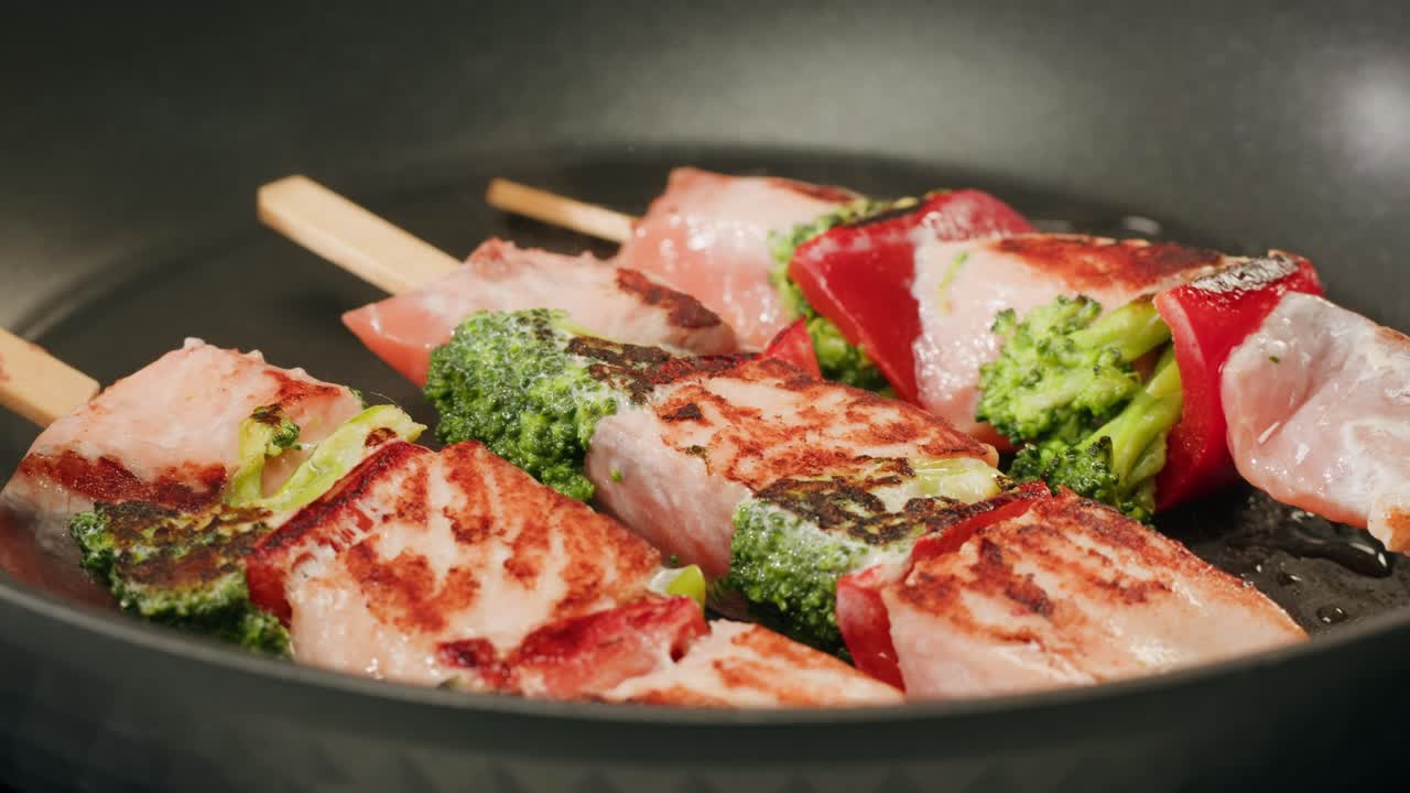Salmon and Vegetable Skewers in a Pan