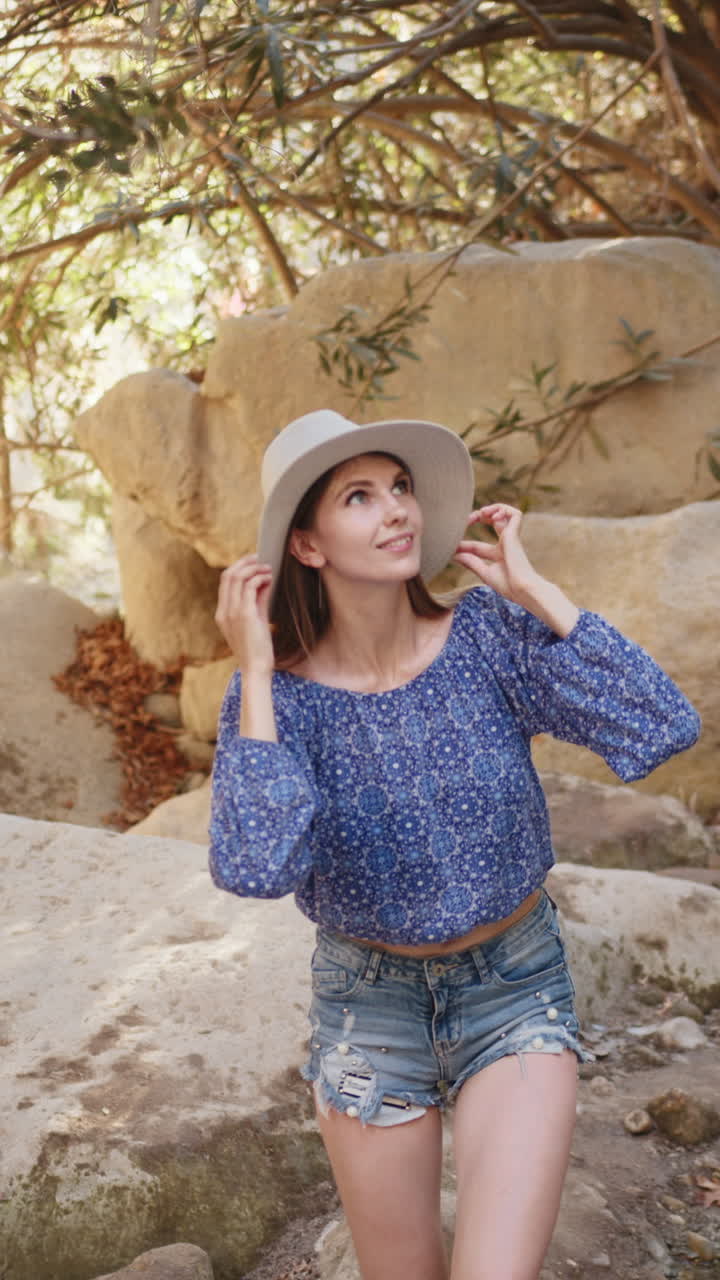 Woman in nature with hat