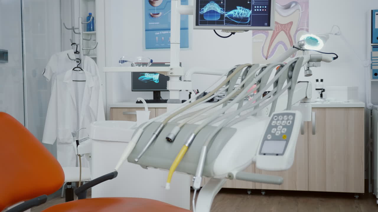 Close up revealing shot of medical orthodontic display with teeth xray images