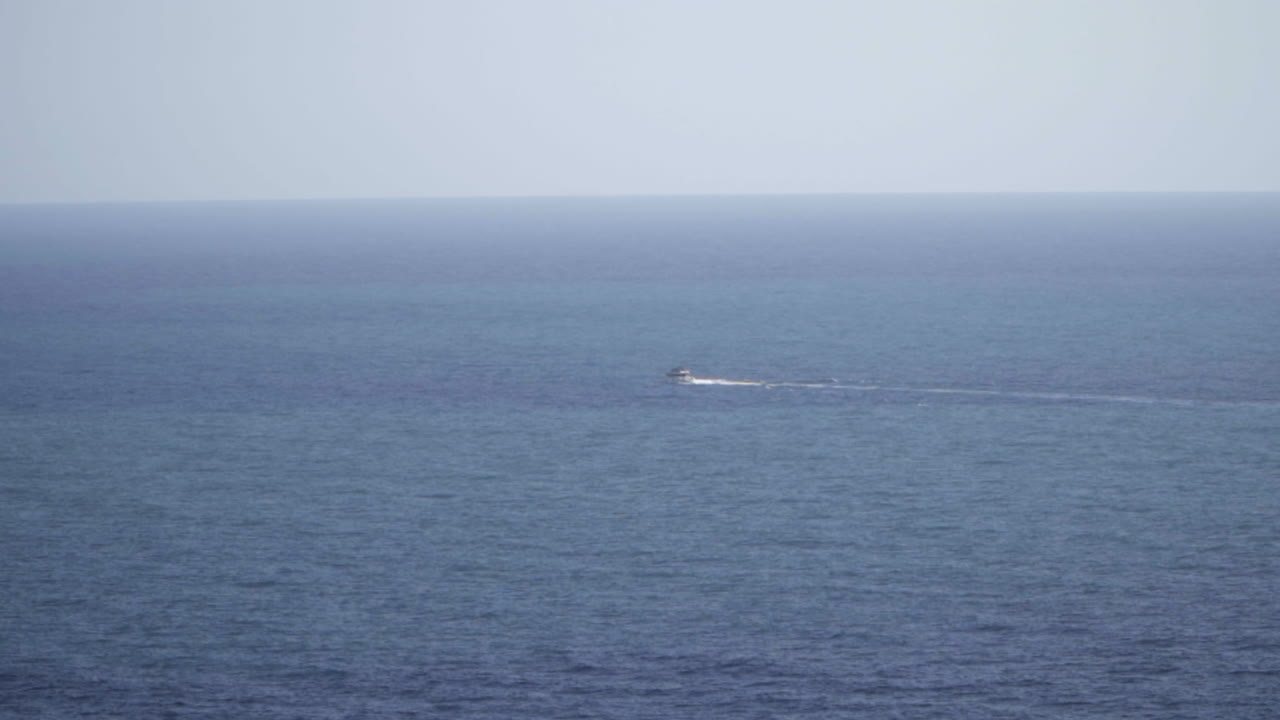 Small Boat on a Calm Ocean