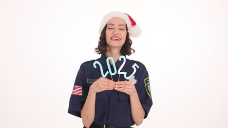 Happy Woman in Police Uniform and Santa Hat Celebrating New Year 2023
