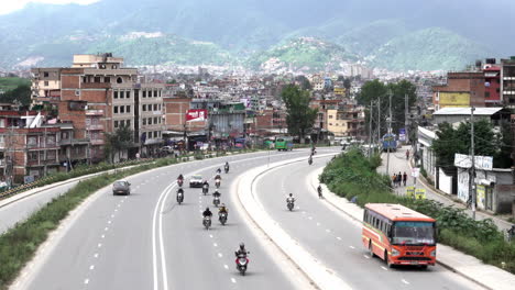 kathmandu, nepal - october 1, 2019: traffic on the roads of kathmandu, nepal and the pollution in the city.