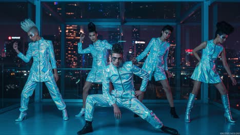 dynamic group of fashion models in futuristic silver outfits against a neon cityscape background, showcasing bold styles and edgy poses