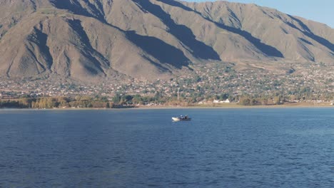 Aerial-Tracking-Of-Fishermen-Fishing-From-Small-Boat