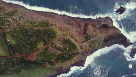 drone top down descent over lighthouse of ponta dos rosais on são jorge island