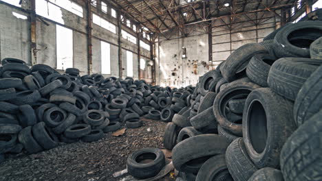 old damaged tires after driving. stack of car second used car rubber tires