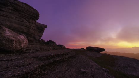 landscape at sunrise over some rocky mountains