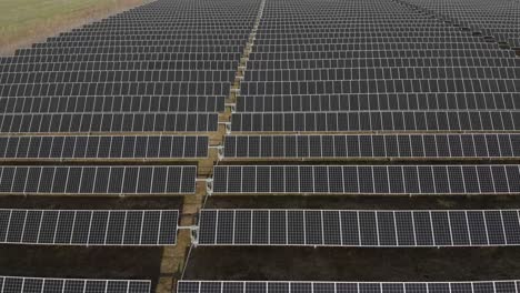 long horizontal solar panels in a rural field