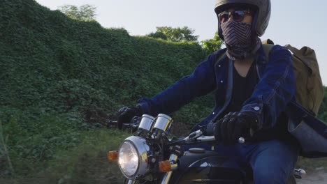 motorcycle rider on a country road
