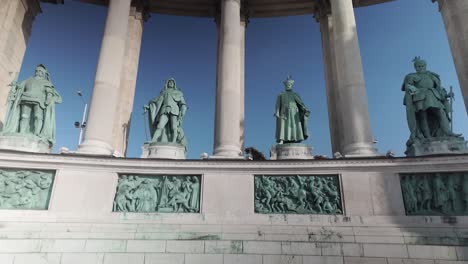 tilt up to historical hungarian hero statues in heroes square, budapest