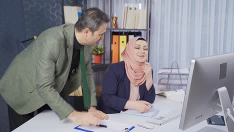 business woman in hijab informs her boss about the progress of business.