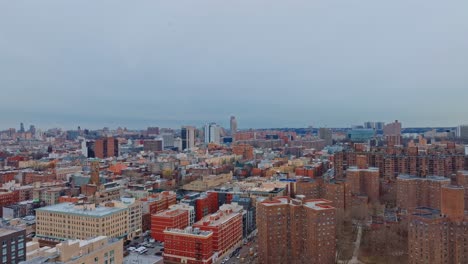 wide shot with 4k drone over harlem projects in new york city, day
