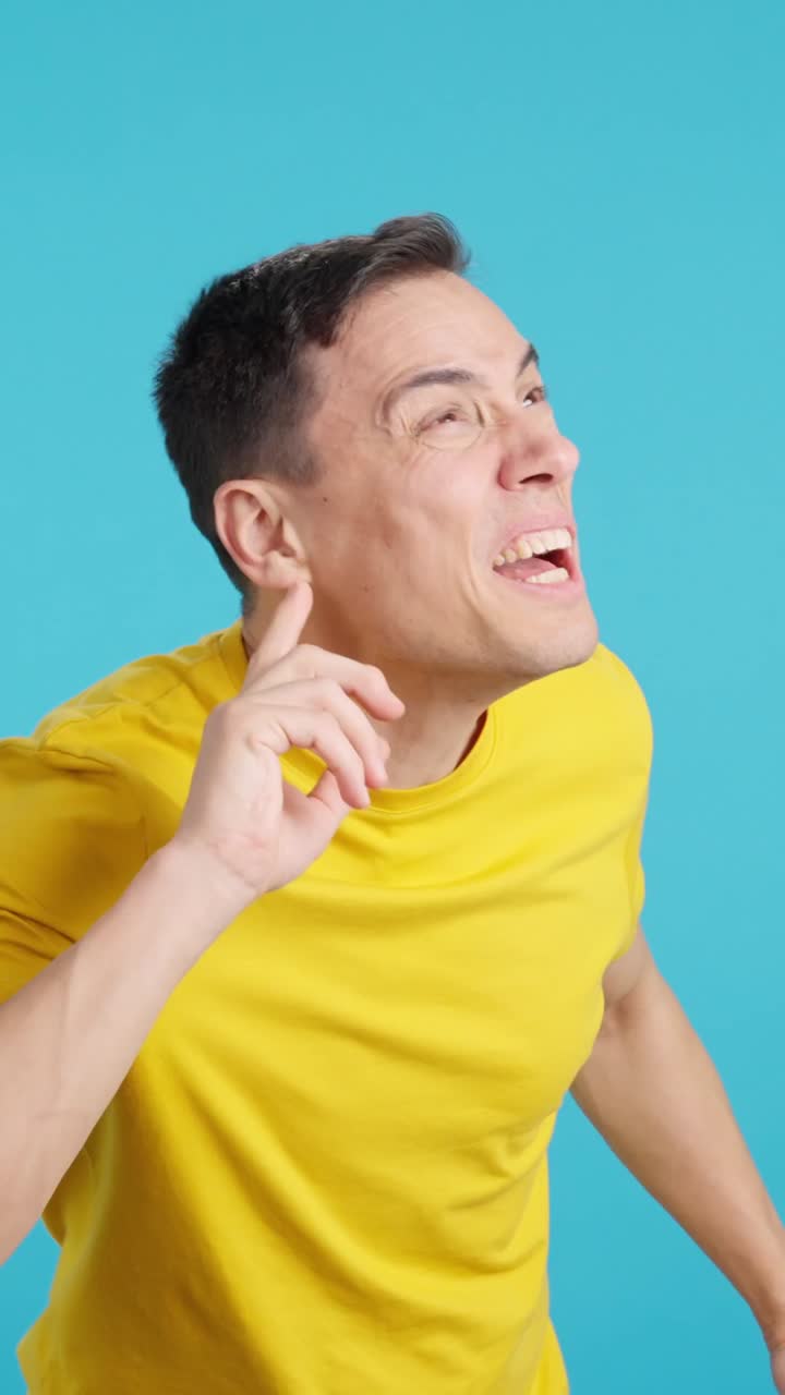 A man making facial expressions