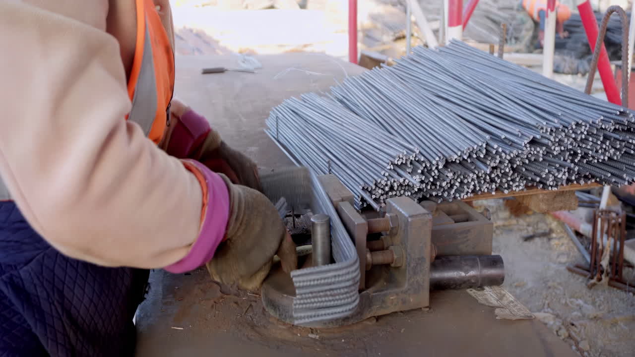 Construction Workers Collaborating in uniforms, hard hats working on new building site. Construction laborers skillfully working on a high-rise building, showcasing dedication and effort
