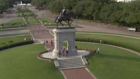 drone view of the sam houston statue in hermann park in houston, texas