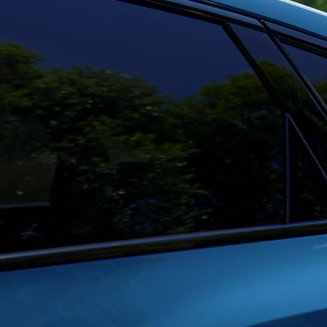Light blue automobile on a road. Modern audi e-tron driving on a highway for saving environment. Test drive of a luxury electronic car model