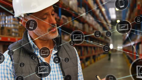 animation of networks of connections with icons over man working in warehouse