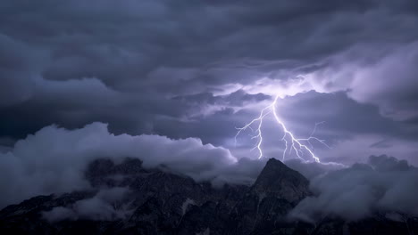 lightning storm over mountain peaks