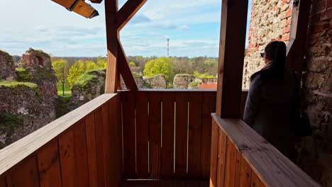 vantage point view of ancient stone ruins and spring landscape from bauska castle museum