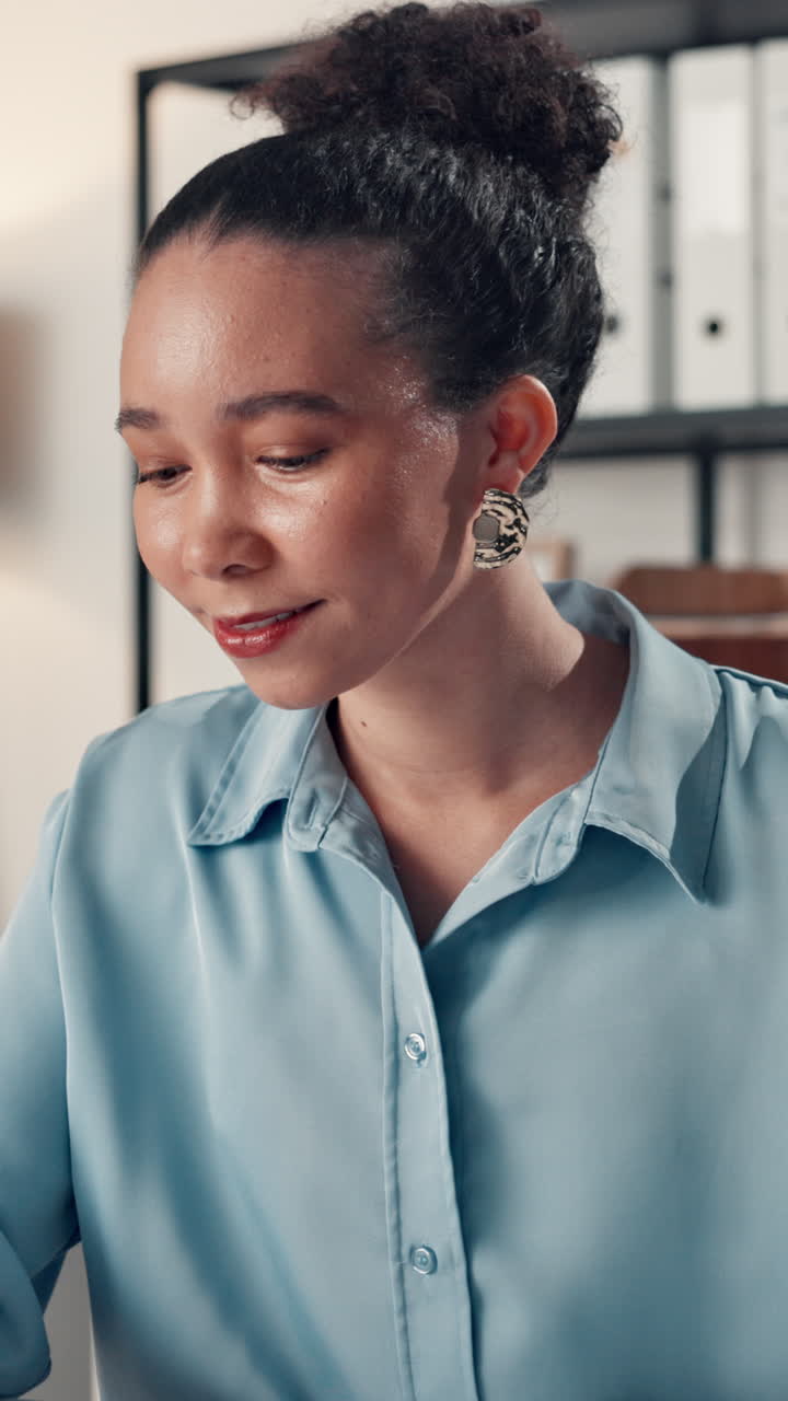 Professional Woman Smiling While Working in Office