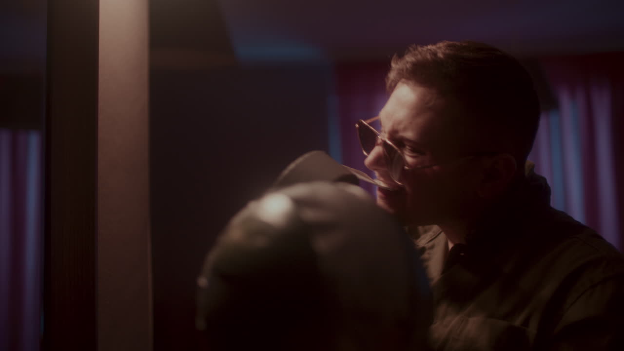 Man Holding a Roll of Duct Tape