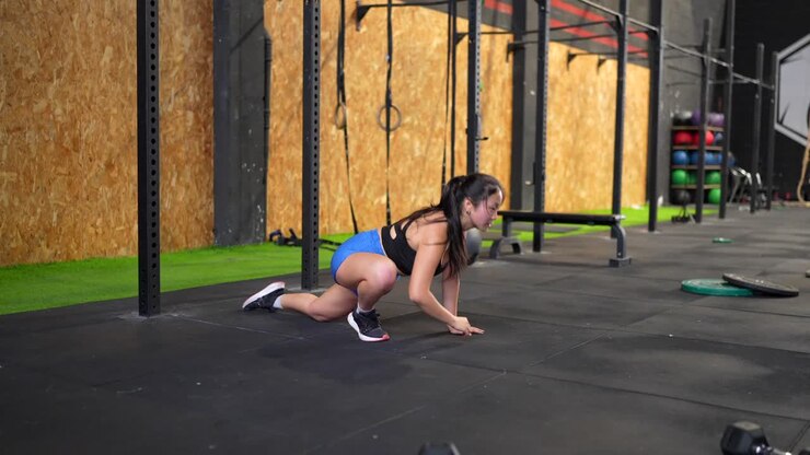 Woman Stretching in Gym