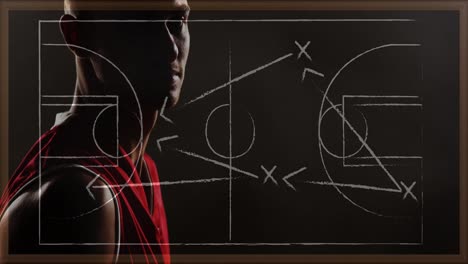 Animation-of-drawing-of-game-plan-over-biracial-basketball-player