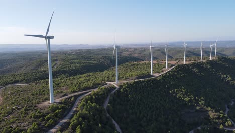 drone shot of a wind farm for eolic energy production in catalonia, spain