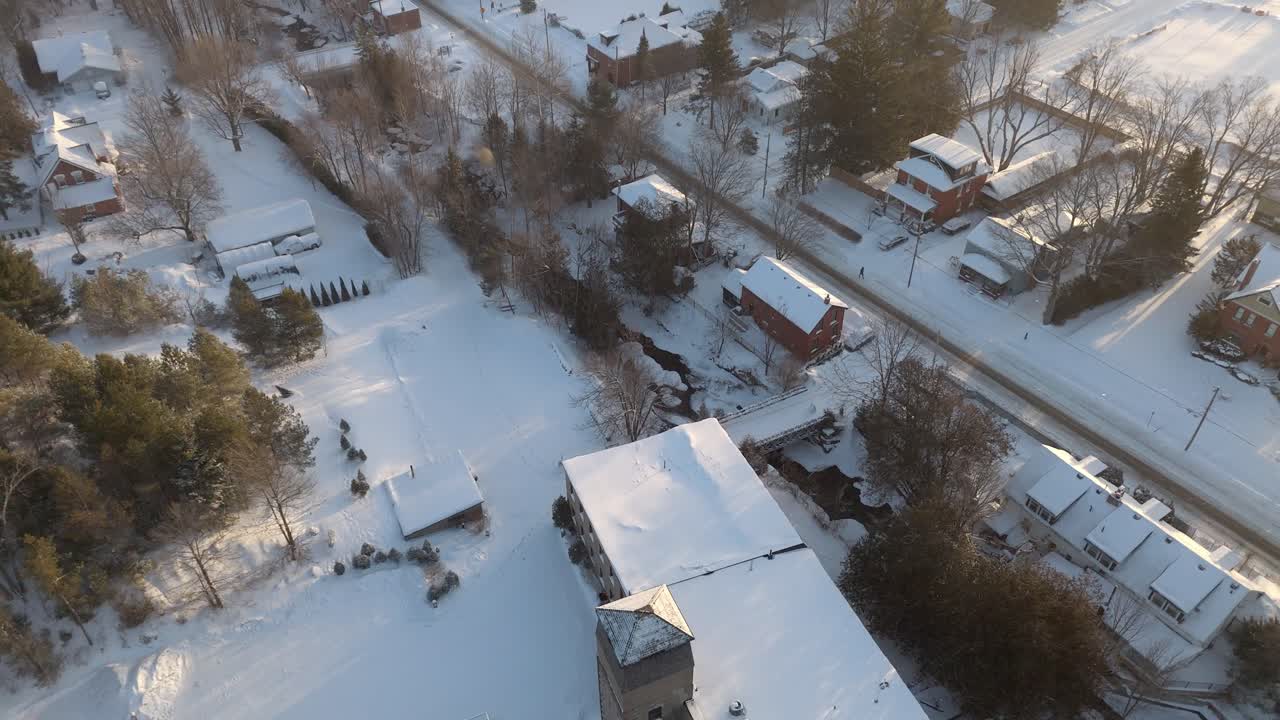 Alton Mill in Alton, Ontario, surrounded by snow-covered landscape during winter