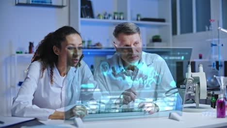 two scientists satisfied with experiment results, looking at holographic screen