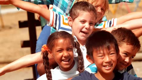 happy schoolkids playing in playground