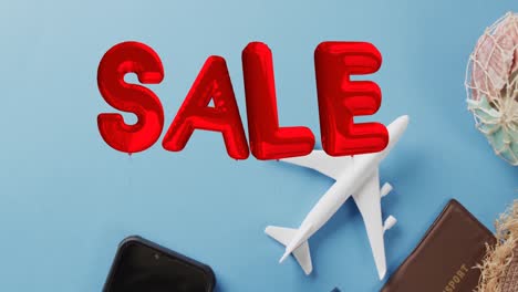Animation-of-sale-text-over-travel-equipment-and-plane